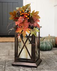 Lantern with fall leaves